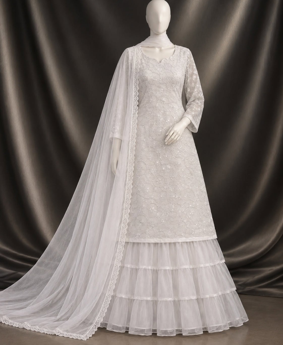White & Black Net Embroidered Sharara Suit.